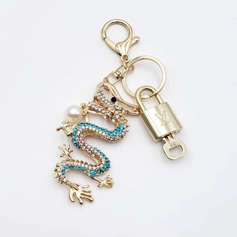 Authentic Louis Vuitton Lock & Key with unbranded Rhinestone Dragon Bagcharm